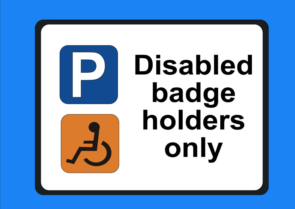 Disabled Badge Holders Only road sign.